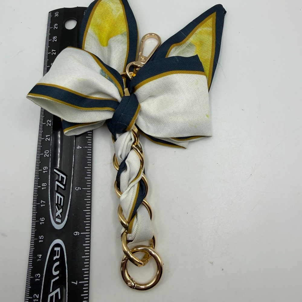 Elegant Gold and White Bow Keychain